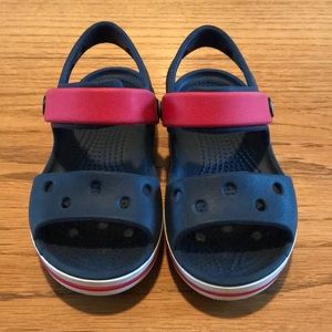 Navy blue Crocs sandals